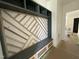 Custom mudroom design with built-in bench, shelves, and drawers at 135 Cherry Bark Dr, Youngsville, NC 27596