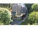 Aerial view showing the back of the house with multi-tiered decks perfect for entertaining and outdoor relaxation at 2213 Weybridge Dr, Raleigh, NC 27615
