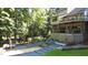 Sprawling back yard features an outdoor living area with tiered landscaping at 2213 Weybridge Dr, Raleigh, NC 27615