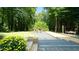 Secluded backyard is perfect for entertaining and features a gravel entertaining area at 2213 Weybridge Dr, Raleigh, NC 27615