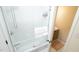 Contemporary bathroom features a glass shower enclosure, and natural wood vanity at 2213 Weybridge Dr, Raleigh, NC 27615
