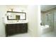 Primary bathroom with double vanity and walk-in shower/tub at 2213 Weybridge Dr, Raleigh, NC 27615