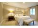 Cozy bedroom featuring a comfortable bed, bedside tables, and soft lighting at 2213 Weybridge Dr, Raleigh, NC 27615