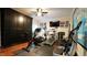 Inviting home gym featuring wall-mounted TV and high end exercise equipment at 2213 Weybridge Dr, Raleigh, NC 27615