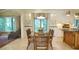 Open kitchen and dining area with seating for six and plenty of storage at 2213 Weybridge Dr, Raleigh, NC 27615