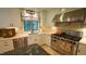 Modern kitchen with a large island, stainless steel appliances, and custom countertops at 2213 Weybridge Dr, Raleigh, NC 27615