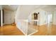 Upstairs landing with a view to the main floor at 2213 Weybridge Dr, Raleigh, NC 27615