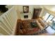 Inviting living room boasts a fireplace, hardwood floors, and comfortable seating at 2213 Weybridge Dr, Raleigh, NC 27615
