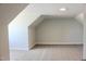Bonus room with neutral carpet, recessed lighting, and a sloped ceiling design at 48 Surles Landing Way, Benson, NC 27504
