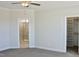 Bright main bedroom with ensuite bath featuring a large shower and a walk-in closet at 48 Surles Landing Way, Benson, NC 27504