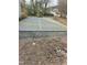 Newly installed concrete driveway with caution tape is ready for vehicles at 722 Martin St, Durham, NC 27704