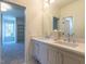 Elegant bathroom with double vanity, white countertops, and stylish fixtures, creating a serene space at 1307 Mayfair Rd, Raleigh, NC 27608
