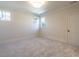 Bright bedroom with carpet, neutral walls and a large window at 1307 Mayfair Rd, Raleigh, NC 27608