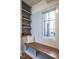 Built-in shelves and bench offer storage and seating at 1307 Mayfair Rd, Raleigh, NC 27608