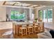 Modern kitchen boasts a large island, stainless steel appliances, and eat in bar at 1307 Mayfair Rd, Raleigh, NC 27608