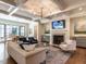 Bright living room featuring a fireplace and ample seating at 1307 Mayfair Rd, Raleigh, NC 27608