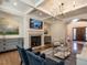 Open concept living area with fireplace and views to entry at 1307 Mayfair Rd, Raleigh, NC 27608