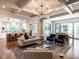 Open living space with kitchen views, hardwood floors, and comfortable seating at 1307 Mayfair Rd, Raleigh, NC 27608