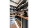 Walk-in pantry with ample shelving for storage and wood countertops at 1307 Mayfair Rd, Raleigh, NC 27608