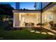 Outdoor patio featuring white fireplace, a ceiling fan, and comfortable seating area at 1307 Mayfair Rd, Raleigh, NC 27608