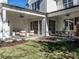 Covered patio with seating area and a dining table at 1307 Mayfair Rd, Raleigh, NC 27608