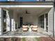 Relaxing outdoor patio with seating area and fireplace at 1307 Mayfair Rd, Raleigh, NC 27608