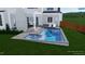 Luxury pool and spa with surrounding patio at 1307 Mayfair Rd, Raleigh, NC 27608