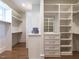 Spacious walk-in closet with ample shelving and hanging space at 1307 Mayfair Rd, Raleigh, NC 27608