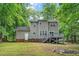 House exterior with deck and wooded backyard at 1554 Middle Ridge Dr, Willow Springs, NC 27592