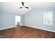 Large bedroom with vaulted ceiling, dark wood floors, and ensuite bathroom at 1554 Middle Ridge Dr, Willow Springs, NC 27592