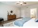 Bedroom features a comfortable bed, stylish decor, and a convenient ensuite bathroom at 162 Vega Loop, Sanford, NC 27330
