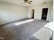 Large bedroom with neutral paint, carpet, ceiling fan, and ample natural light at 162 Vega Loop, Sanford, NC 27330