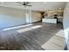 Spacious open living room area featuring new hardwood floors and kitchen island at 162 Vega Loop, Sanford, NC 27330