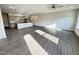 Spacious living room with new hardwood floors and kitchen island at 162 Vega Loop, Sanford, NC 27330