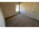 Cozy bedroom with a window and carpeted flooring at 17 E Victory View Ter, Smithfield, NC 27577