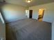 Large bedroom with neutral carpeting and an ensuite bathroom at 17 E Victory View Ter, Smithfield, NC 27577
