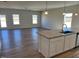 Open-concept space featuring kitchen island and spacious living area at 17 E Victory View Ter, Smithfield, NC 27577