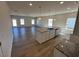 Open-concept space featuring kitchen island and spacious living area at 17 E Victory View Ter, Smithfield, NC 27577
