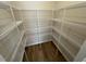 Walk-in pantry with wire shelving offering ample storage space at 17 E Victory View Ter, Smithfield, NC 27577