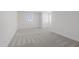 Expansive bedroom with plush carpeting and ample natural light at 2006 Anna Lilley Dr # 72, Fuquay Varina, NC 27526