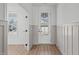 Inviting entryway with wood flooring, decorative moldings, and natural light at 2006 Anna Lilley Dr # 72, Fuquay Varina, NC 27526