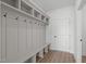 Well-organized mudroom with bench, coat hooks, and cubbies for efficient storage at 2006 Anna Lilley Dr # 72, Fuquay Varina, NC 27526