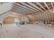 Spacious unfinished room, showcasing wood framing, exposed beams, and potential for customization at 2006 Anna Lilley Dr # 72, Fuquay Varina, NC 27526