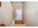 Entryway with staircase and door leading into the home at 2019 Tennessee Rd, Durham, NC 27704