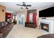 Living room with fireplace, TV, and access to deck at 2019 Tennessee Rd, Durham, NC 27704