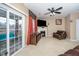 Living room featuring a fireplace and access to a deck at 2019 Tennessee Rd, Durham, NC 27704