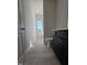Simple bathroom with dark vanity and toilet, featuring a window at 216 Vili Dr, Broadway, NC 27505