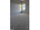 Simple bedroom with a window and neutral-colored walls at 216 Vili Dr, Broadway, NC 27505