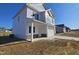 Two-story house with white siding, brick accents, and a covered porch at 216 Vili Dr, Broadway, NC 27505