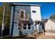 Modern two-story home with blue siding and a balcony at 2407 Hart St # A, Durham, NC 27703